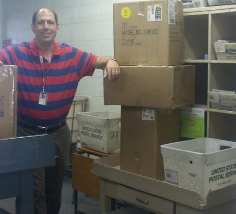 A Picture of Ray at work in the Post Office